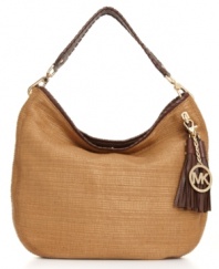 Stay on trend with this season's must-have: the straw bag. Fun tassel detail and shiny 18K gold hardware add a carefree edge to this stunning design from MICHAEL Michael Kors.