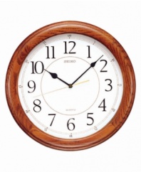 This handsome wall clock from Seiko features a beautiful solid oak case. Round white dial with logo, numeral indices and quiet sweep second hand. One AA battery included. Measures approximately 13 inches in diameter and 1-1/2 inches deep.