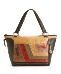 The Sak presents the Iris shopper in a textured pebble leather with an optional long strap that makes it so versatile.