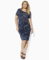Cut from fluid matte jersey, this plus size scoopneck dress from Lauren by Ralph Lauren with a gracefully draped silhouette and three-quarter length sleeves is the epitome of classic elegance.