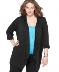 Add a relaxed layer to your look with Style&co.'s three-quarter sleeve plus size cardigan, punctuated by a handkerchief hem.
