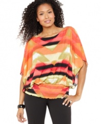 A soft drape and plenty of bold color make this petite Style&co. top stand out! Pair it with classic black pants or jeans for a sophisticated anytime look.