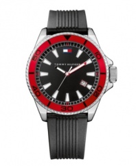 Bold and athletic, this watch by Tommy Hilfiger nails all-American design. Black ribbed silicone strap and round silver tone mixed metal case with red bezel. Black dial features luminous stick indices, date window at four o'clock, red and black luminous hands and logo at twelve o'clock. Quartz movement. Water resistant to 30 meters. Ten-year limited warranty.