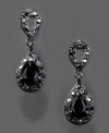 Be the queen of the night. These sultry Monet earrings feature jet black crystal accents set in silvertone mixed metal. Approximate drop: 1 inch.