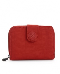 A lightweight nylon wallet from Kipling that's on the money-pair it with your favorite Kipling purse or use it on its own!