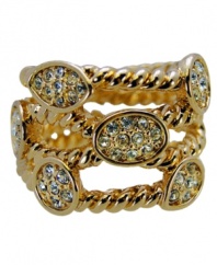 A distinguished design. Sparkling clear crystals in a beautiful bezel setting stand out on this stylish twist ring from T Tahari's Essentials Collection. Made in gold tone mixed metal, it's nickel-free and well suited for sensitive skin. Size 7.
