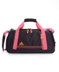 Built with the needs of the female athlete in mind. This duffle bag by Adidas features a roomy main compartment complete with multiple zipper and mesh pockets, and adjustable padded straps for easy portability. A freshPAK ventilated shoe tunnel keeps your sneakers separate from main compartment.