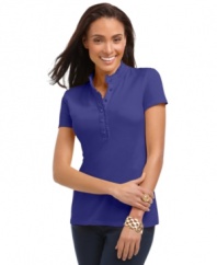 A petite polo top in vibrant colors is a warm-weather essential. Charter Club designed it with ruffled trim at the placket and collar for extra feminine flair.