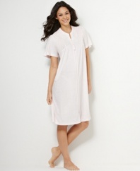 Easy does it. Comfort is a guarantee with the soft terry cloth of this slinky knit zippered robe by Miss Elaine.