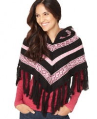 Desert chic for those extra chilly nights. Drape your shoulders with this patterned poncho from American Rag. The added hood adds functional style.