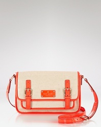 The satchel is on this season's style agenda, and what better way to work the trend than this canvas style from kate spade new york -- it will lend your look preppy flair.