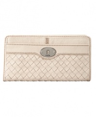 A timeless style featuring clean lines and a refined woven design, perfectly accented with vintage-chic hardware. This gorgeous clutch from Fossil is perfect for both day or night.