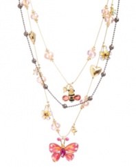Pretty in pink. Betsey Johnson puts this pastel hue to good use in a delicate three-row illusion necklace. Crafted in gold-plated mixed metal with a striped bumblebee, a pink butterfly and sparkling crystal accents. Approximate length: 16 inches + 2-inch extender. Approximate drop: 3-1/4 inches.
