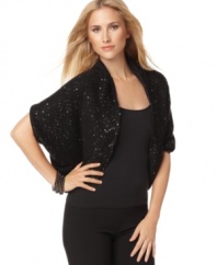 Top your look off with a chic, sparkling cozy from Calvin Klein!