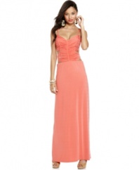 Baby Phat's strapless maxi dress is on-trend for an endless summer of fun. Pair it with bold earrings and nude heels for a sexy date night outfit.