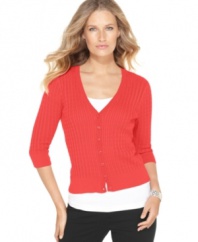 A classic cardigan gets a cute new look from Eight Eight Eight! A micro-cable knit and a cropped, fitted silhouette make this sweater a unique addition to your closet.