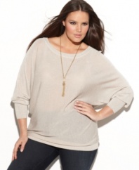 Shine from day to night with INC's long sleeve plus size top, featuring a metallic finish and banded hem.