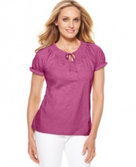 A pretty peasant silhouette and subtle floral embroidery makes this petite top by Charter Club one that's effortless to pair with pieces already in your closet.