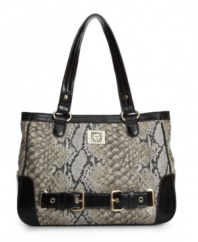 Slither your way into great style with this snakeskin print satchel by Anne Klein. Silvertone hardware and a high-shine finish give this bag the perfect style for day or night.
