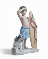 A boy and his best friend appraise the waves on this adorable figurine. Evoking golden days spent on the beach, it's crafted of fine porcelain, with delicate painted hues and a high-gloss finish. Measures 7.5 x 4.5.