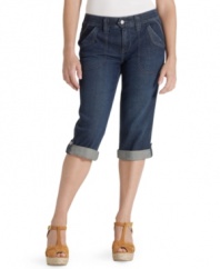 Flap patch pockets give these petite Levi's capris a cool utility-chic feel. Buttoned tabs at the cuffs make rolling them up easy.