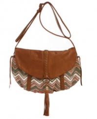 A chevron print canvas bag is the perfect relaxed weekend style to tote around while shopping for the latest vintage finds. This Lucky Brand crossbody features stitched trim and a tassel detail that dangles from flap.