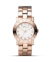 Gleaming rose gold creates soft shine with a crystal-studded, logo-detailed white dial. From MARC BY MARC JACOBS.