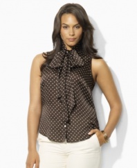 Tailored in airy, luxuriously smooth silk georgette, this sleeveless plus size Lauren by Ralph Lauren blouse channels modern femininity with a chic polka-dot print and a ladylike bow tie at the neckline.