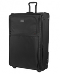 Larger than life luxury. The Tumi Alpha collection's largest wheeled packing case, this amazing expandable upright offers the option of carrying suits and even has a removable tote bag to help you bring home extra items acquired during your travels. Tumi quality assurance warranty.