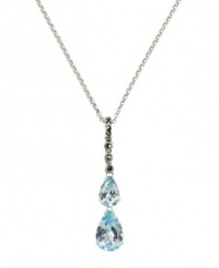 Subtle teardrops add shimmer to your neckline. Judith Jack's stunning y-shaped pendant highlights two pear-cut blue topaz (3-3/8 ct. t.w.) with sparkling marcasite at the bail (1/5 ct. t.w.). Crafted in sterling silver. Approximate length: 16 inches. Approximate drop: 1-5/8 inches.