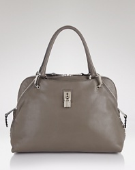 Add a luxe accent to your look with this zip-detailed studded leather satchel from Marc Jacobs.
