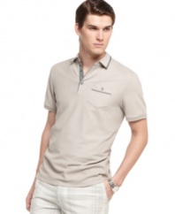 This classic polo from Calvin Klein provides timeless style for your casual attire.