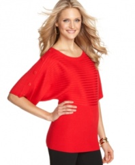 Joseph A's tunic sweater gives you a new way to wear stripes! A row of shoulder buttons offsets the chic damask pattern.