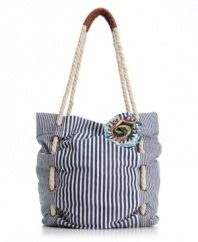 Sweet stripes and a fabulous floral embellishment give this American Rag bag the perfect warm weather look. Woven rope straps add a nautical touch to this oh-so adorable design.