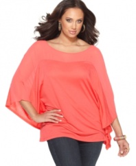 Be an image of sheer perfection with Soprano's batwing sleeve plus size top, featuring poncho styling.