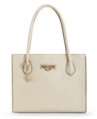 This show-stopping shopper by DKNY will grab attention for all the right reasons. Gorgeous goldtone hardware and a signature charm decorate this fabulous leather design.