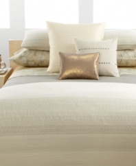 Two rows of horizontal coins line this pillow for a strong impression that ties the colors of your bed together. Strong detailing and unique textures punctuate the subtle nude tone.