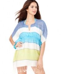Your building block for the ideal beach ensemble: This colorful striped tunic channels coastal style with fringe detail and subtle shine.