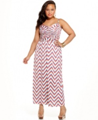 Rock one of the season's scorching trends with Baby Phat's sleeveless plus size maxi dress, finished by ruching.
