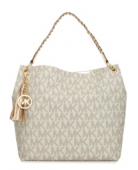 Loyal MICHAEL Michael Kors fashionistas will adore this signature logo bag with 18K gold hardware and gold-hued leather details inside and out. Fabulous and functional!