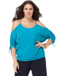 For a sassy look, link up MICHAEL Michael Kors cold-shoulder plus size top and skinny jeans!