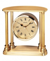 Add stately charm to any tabletop with this refined desk clock from Seiko. Goldtone solid brass four-column frame and floating round case. Round goldtone dial with logo and roman numeral indices. Battery included. Measures approximately 5-1/2 x 5-1/2 x 2.