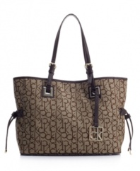 Signature style: Logo jacquard fabric makes this refined tote purse unmistakably Calvin Klein.