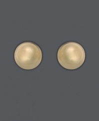Sparkling and simple, these traditional gold ball (4 mm) stud earrings are perfect for tiny ears. Crafted in 14k gold with a flute bell backing.