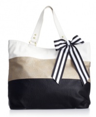 Go mad for this adorable colorblock tote by Steven Madden. This fabulous tri-color design features polished goldtone hardware and a too-cute striped bow detail.