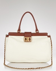 Tory Burch's leather satchel boasts the label's signature Park Avenue polish. Ideal for work or weekend brunches, this bag can handle the essentials with flair.