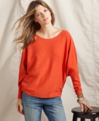 A slouchy cotton sweater with dramatic batwing sleeves is a modern staple, from Tommy Hilfiger.