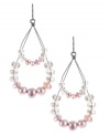Airy and alluring. A lovely, lightweight look defines these delicate orbital drop earrings from Kenneth Cole New York. Adorned with faceted glass beads and imitation pearls in a pretty pastel purple palette, they're crafted in hematite tone mixed metal. Approximate drop: 2-1/2 inches.