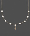 The perfect First Communion gift for a special little girl. This necklace features cultured freshwater pearls (5-6 mm) and a petite 14k gold cross charm. Set in 14k gold. Approximate length: 13 inches. Approximate drop: 1/2 inch.
