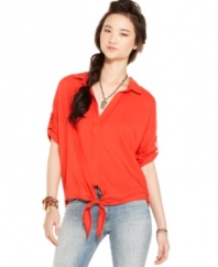 Work it in American Rag's tie-front shirt. The relaxed fit of the shirt is perfect for topping off your skinny jeans!